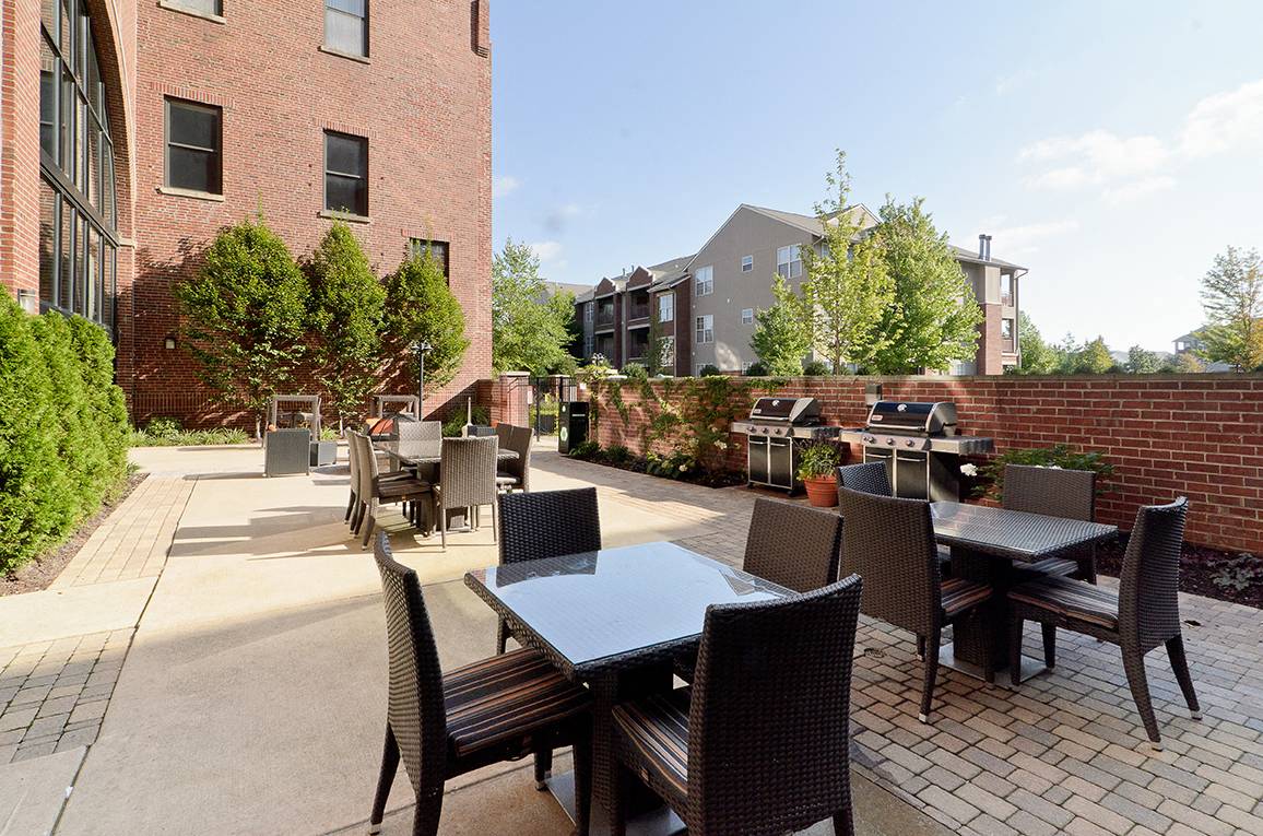 Inviting patio space with grilling and dining area